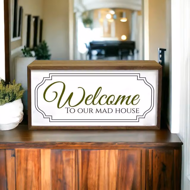 Echo Three LED Welcome To Our Mad House Light Box in Brown Wood