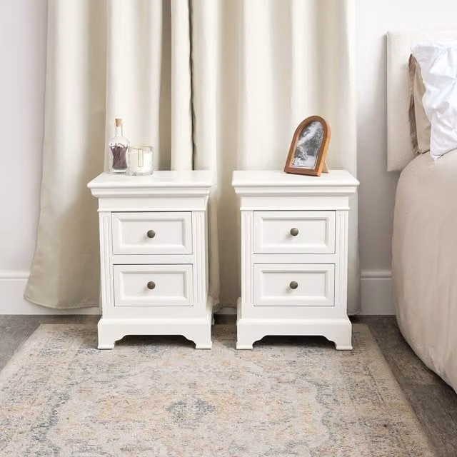 Melody Maison Pair of Ivory Two Drawer Bedside Tables in White Lacquered Wood