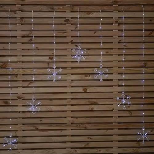 Samuel Alexander Battery Operated Snowflake Christmas Curtain Lights in White and Silver with 147 LEDs, 1.2m