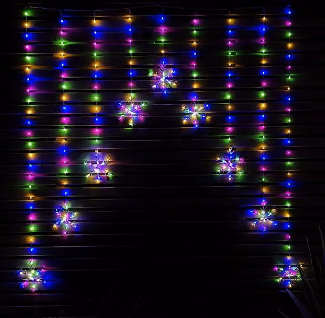 Samuel Alexander Multi Colour Red LED Snowflake Curtain Lights for Christmas Decorations, 1.2 m – 1