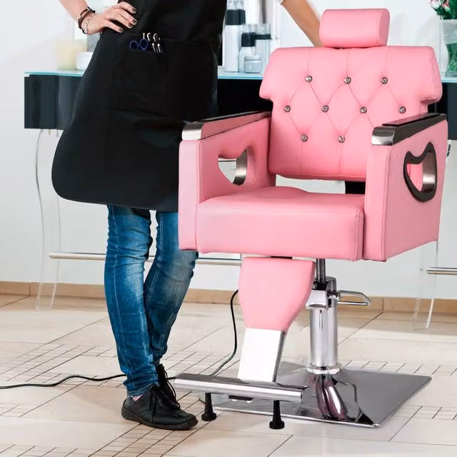 Costway Adjustable Swivel Barber Styling Salon Chair in Pink with Armrests – 1