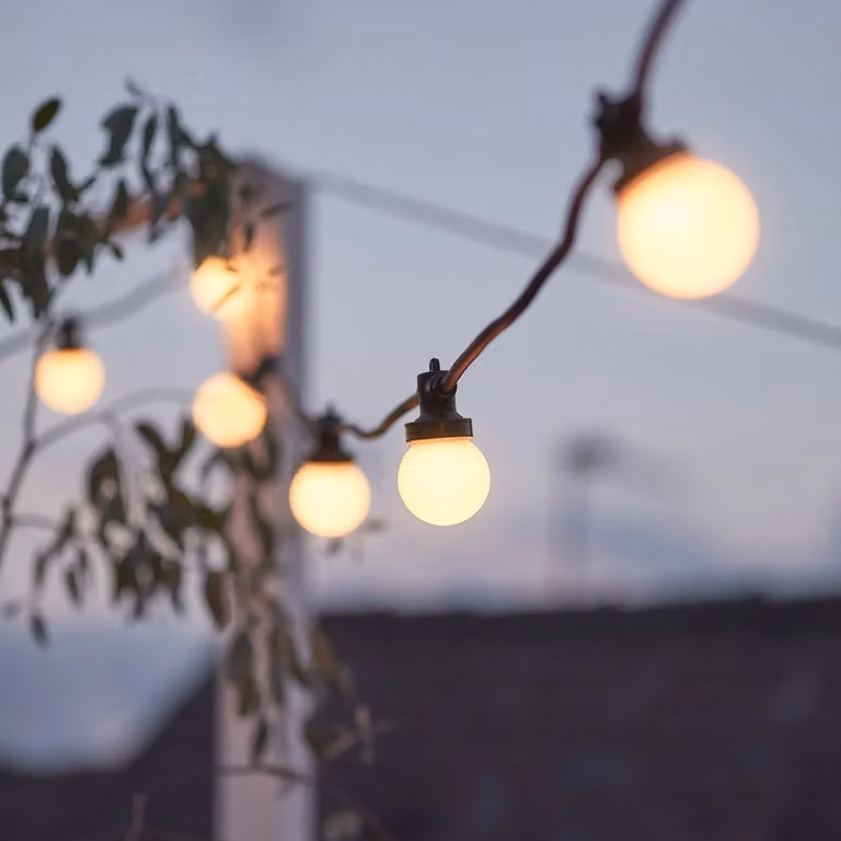 Pro Connect 15m Connectable LED Festoon String Lights with 30 Warm White Sphere Bulbs and Black Cable
