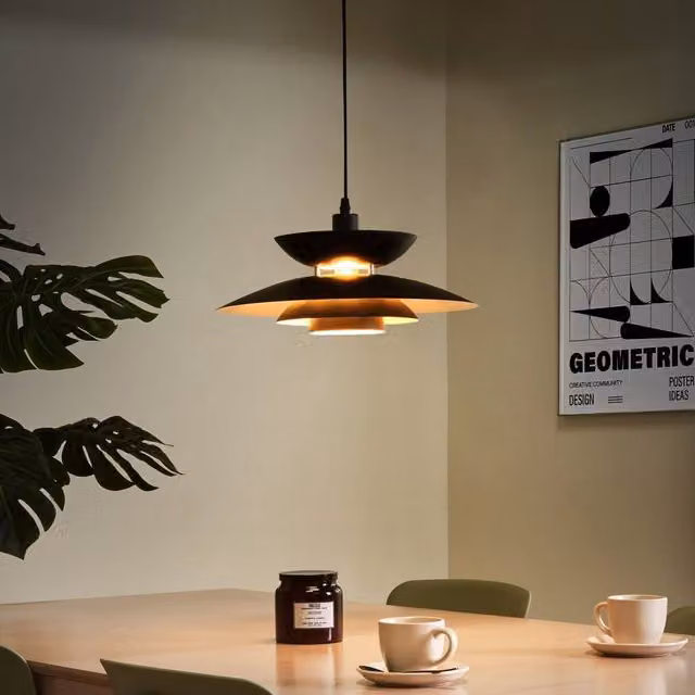 Wyld and Coco Mid-Century Black and Gold/Brass Tiered Metal Pendant Lamp
