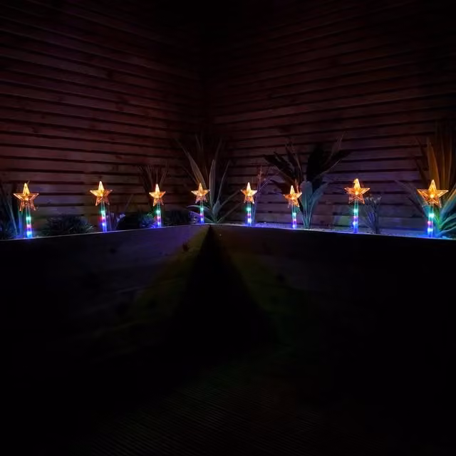 Samuel Alexander Set of 8 Battery Operated Multi Coloured LED Star Path Lights with Timer for Christmas Decoration