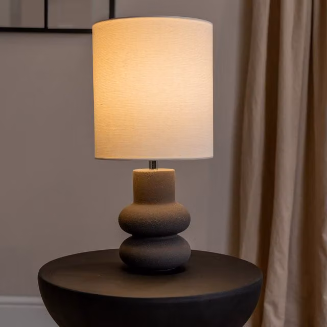 Jude Stacked Abstract Ceramic Table Lamp with Beige Fabric Shade and LED Bulb in Black