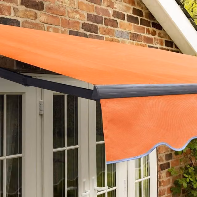 Primrose Manual Folding Arm Patio Awning in Terracotta with Charcoal Aluminium Frame, W: 250 cm, D: 18 cm