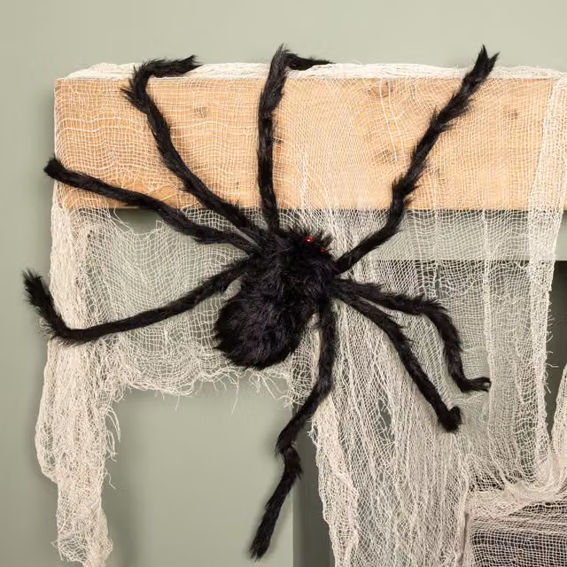 Samuel Alexander 90cm Black Furry Halloween Spider Decoration with Extendable Legs and Red Eyes