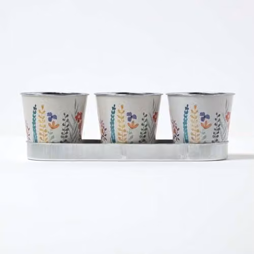 HOMESCAPES Set of 3 Metal Plant Pots with Tray, Floral Design, Grey, White and Multicolour, W/D/H: 33 x 11 x 10.5 cm