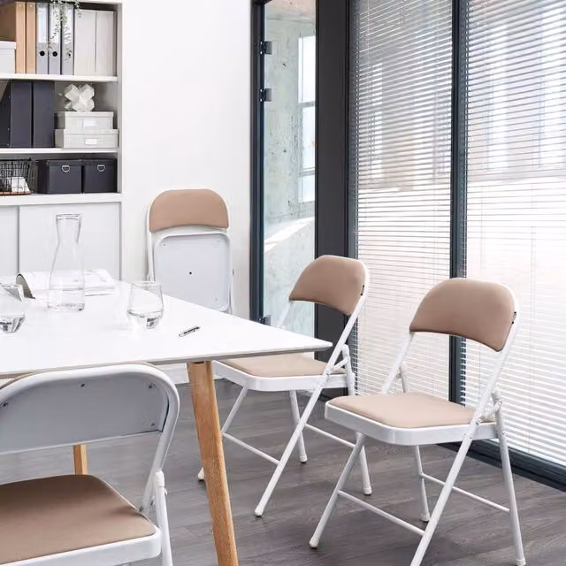 Wyld and Coco 4-Pack of Beige Folding Chairs with Padded Fabric Seats and White Metal Frames – 1