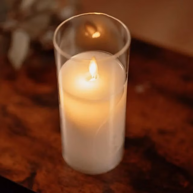 Marco Paul Battery Operated Flameless Round Glass Tabletop Candle with Flicker Effect in Clear and Ivory