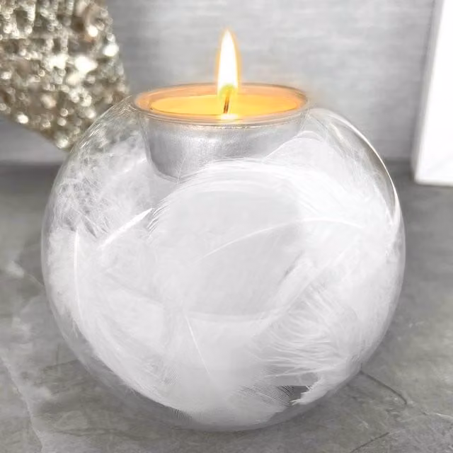 Transparent Round Glass Tea Light Holder with White Angel Wings and Feathers Design