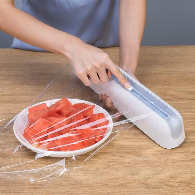 Livingandhome Wall Mounted Plastic Kitchen Wrap Dispenser with Cutter in White