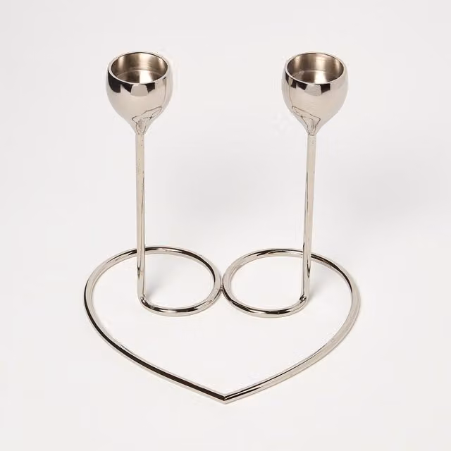 Homescapes Dual Brass Heart Taper Candle Holder in Polished Silver