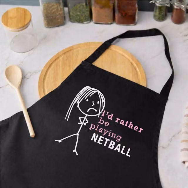 60 Second Makeover Women's I'd Rather Be Playing Netball Apron in Black – 1