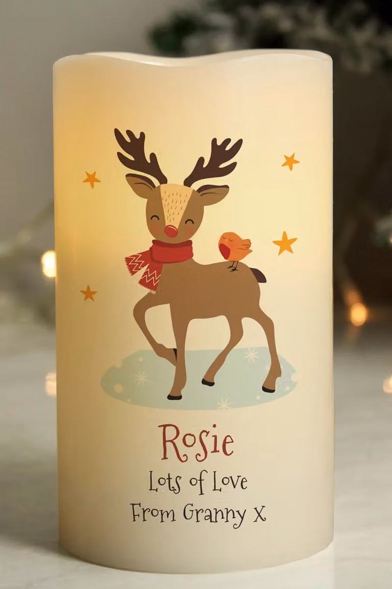 Personalised Memento Company Personalised Christmas Reindeer LED Pillar Candle in Off-White with Flicker Effect