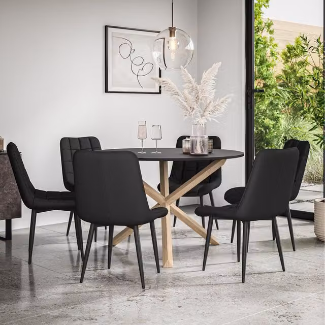More4Homes Malvern Round Black Dining Table Set with Oak Legs and 6 Nova Faux Leather Chairs