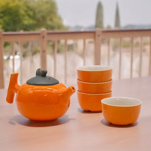 KDMD Orange Ceramic Herbal Teapot Set with Infuser and Four Cups