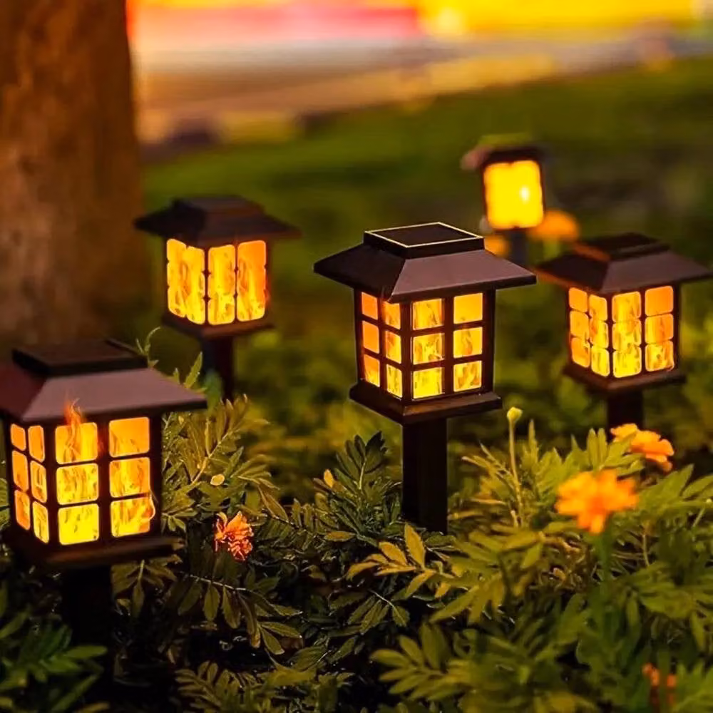NESTLUNE Solar LED Flickering Flame Torch Stake Lights, 4 Pack, Black – 6