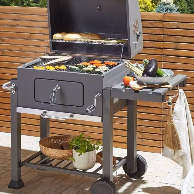 Wyld and Coco Charcoal BBQ Grill with Lid, Thermometer, Warming Rack and Wheels in Grey – 1