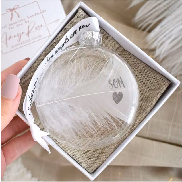 Amaya Rose Ltd In Memory of Son Round Glass Bauble with Feather Detail in Clear and White
