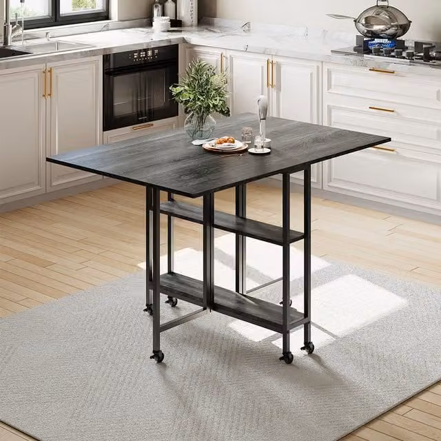 Komore Rustic Wood-Effect Rectangular Folding Dining Table with Storage Shelves and Castors in Grey and Black