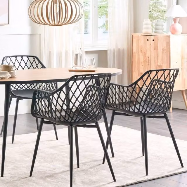 Wyld and Coco Pai Set of 2 Black Dining Chairs with Synthetic Leather Seats and Open Net Backs – 1