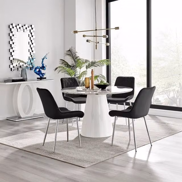 Furniturebox Palma White Marble Effect Round Dining Table and Pesaro Black Velvet Chairs with Silver Legs