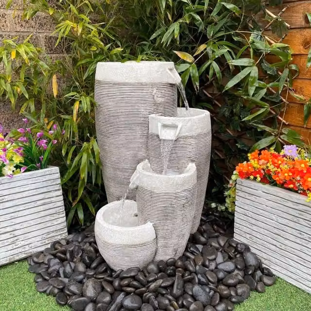 Tranquility Water Features 4 Circular Pouring Pots Solar Powered Cascade Water Feature in Grey Antique Stone
