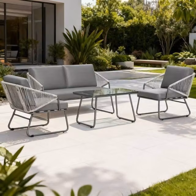 ERGOVEXA Four-Piece Grey Rattan Outdoor Sofa Set with Upholstered Cushions and Powder Coated Steel Frame