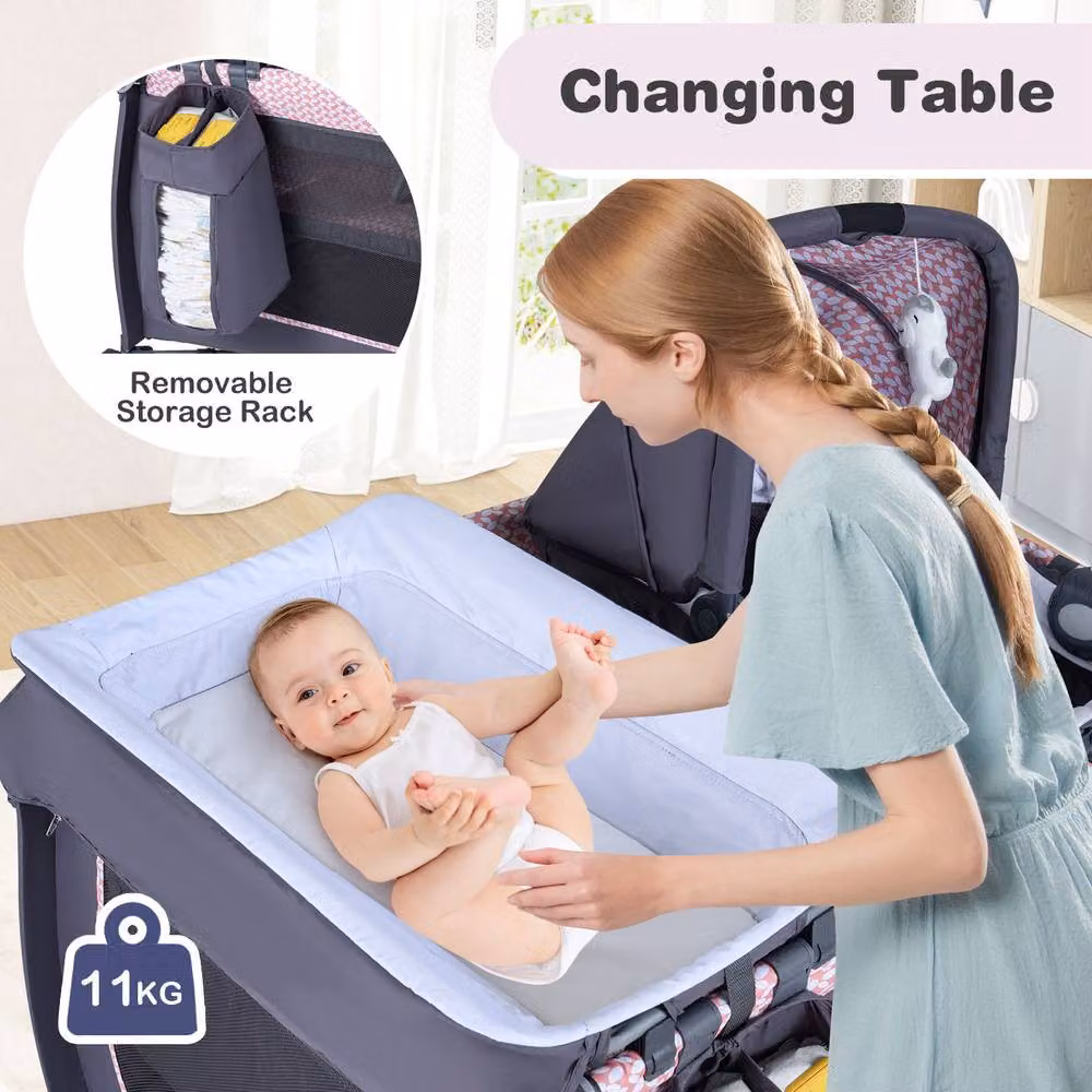 Costway Foldable Pack and Play Portable Baby Playard with Rocking Bassinet and Music Box in Pink – 2