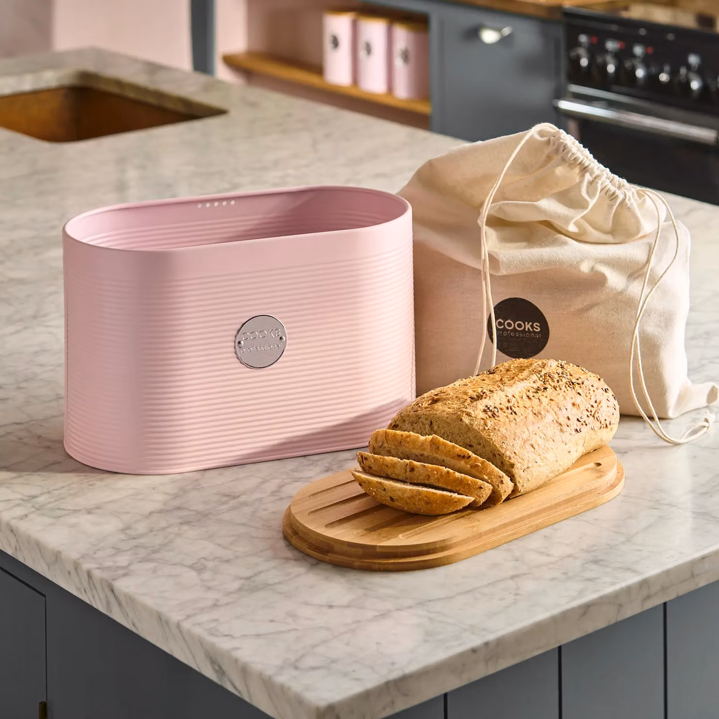 Cooks Professional Ribbed Bread Bin with Linen Bag and 2-in-1 Bamboo Cutting Board Lid, Pink and Silver – 3