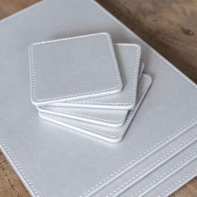 Creative Tops Pack of 4 Square Faux Leather Placemats in Grey and Silver