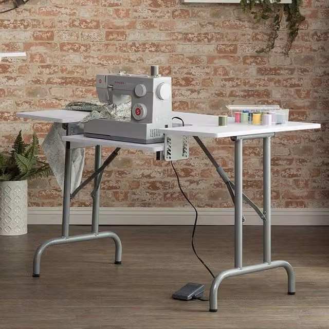 Studio Designs Folding Sewing Table in White and Silver with Height Adjustable Drop Leaf Top
