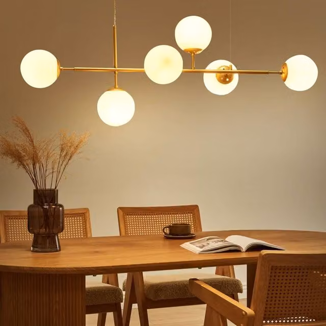 Wyld and Coco Six-Glass Globe Pendant Light in Gold/Brass
