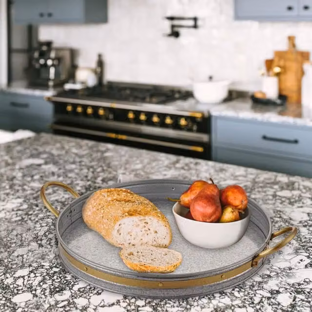 The Mia UK Round Solid Serving Tray in Silver and Gold
