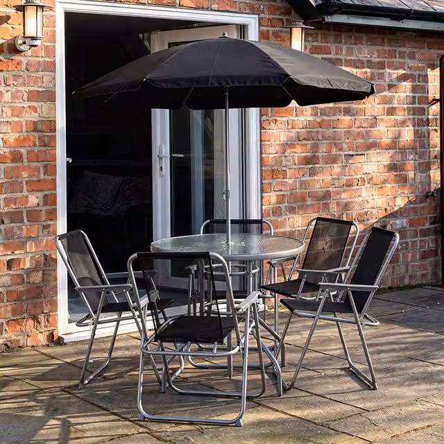 Samuel Alexander 4 Seater Garden Dining Set with Glass Table, Folding Chairs and Black Parasol in Black and Grey