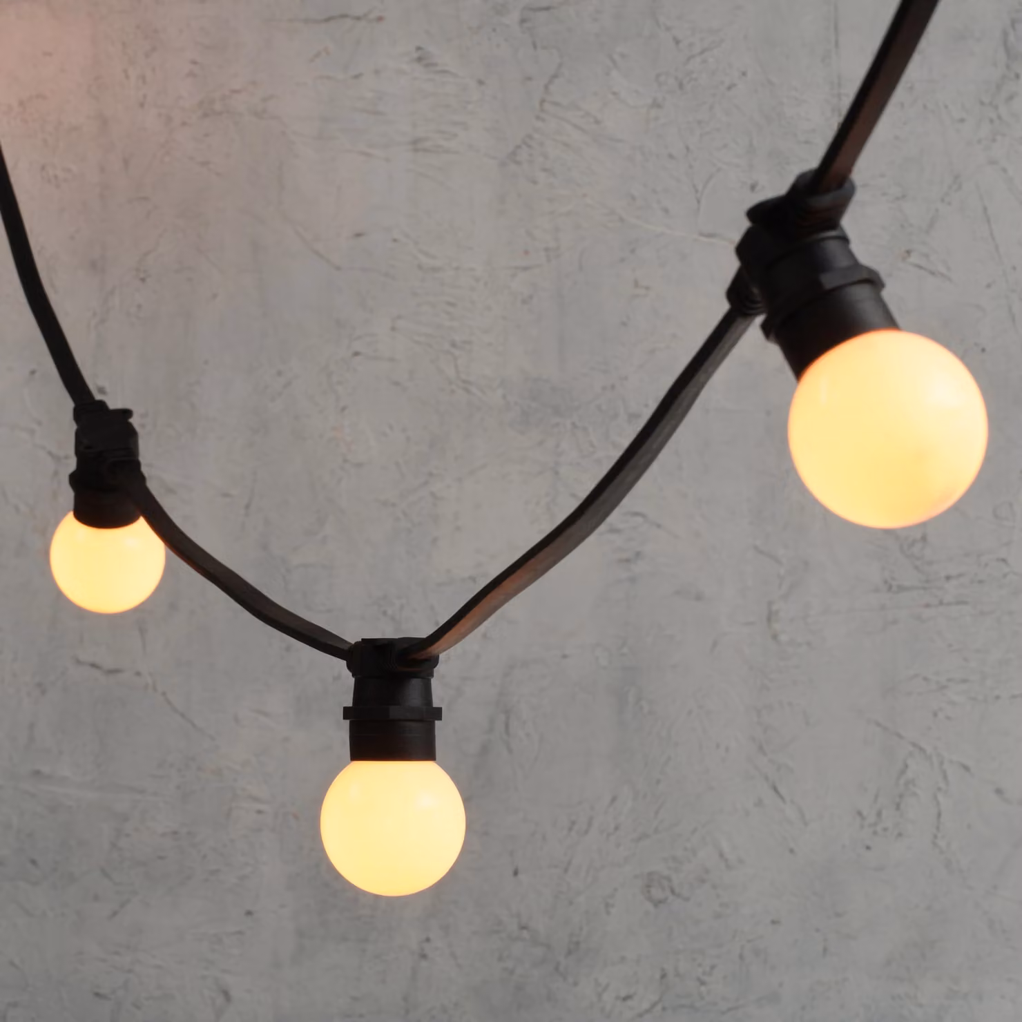 Plus Connect Warm White LED Connectable Festoon Lights with G60 Frosted Bulbs and Black Cable