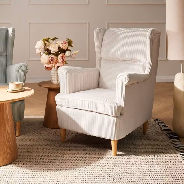 Wyld and Coco Retro Wingback Lounge Chair in Beige Corduroy with Rubberwood Legs – 1