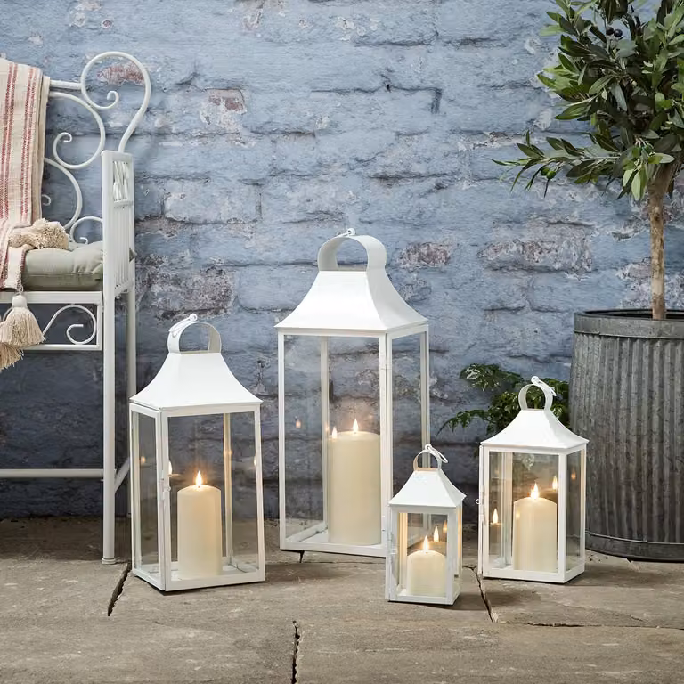 Set of 4 Albury White Metal Tabletop Garden Lanterns with TruGlow Battery Operated Pillar Candles and Remote Control