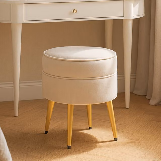 Interiors by Premier Tamra Round Velvet Footstool with Gold Metal Legs in Cream