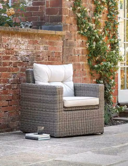 Gallery Direct Porto Polyrattan Garden Storage Chair with Armrests and Cushions in Light Grey