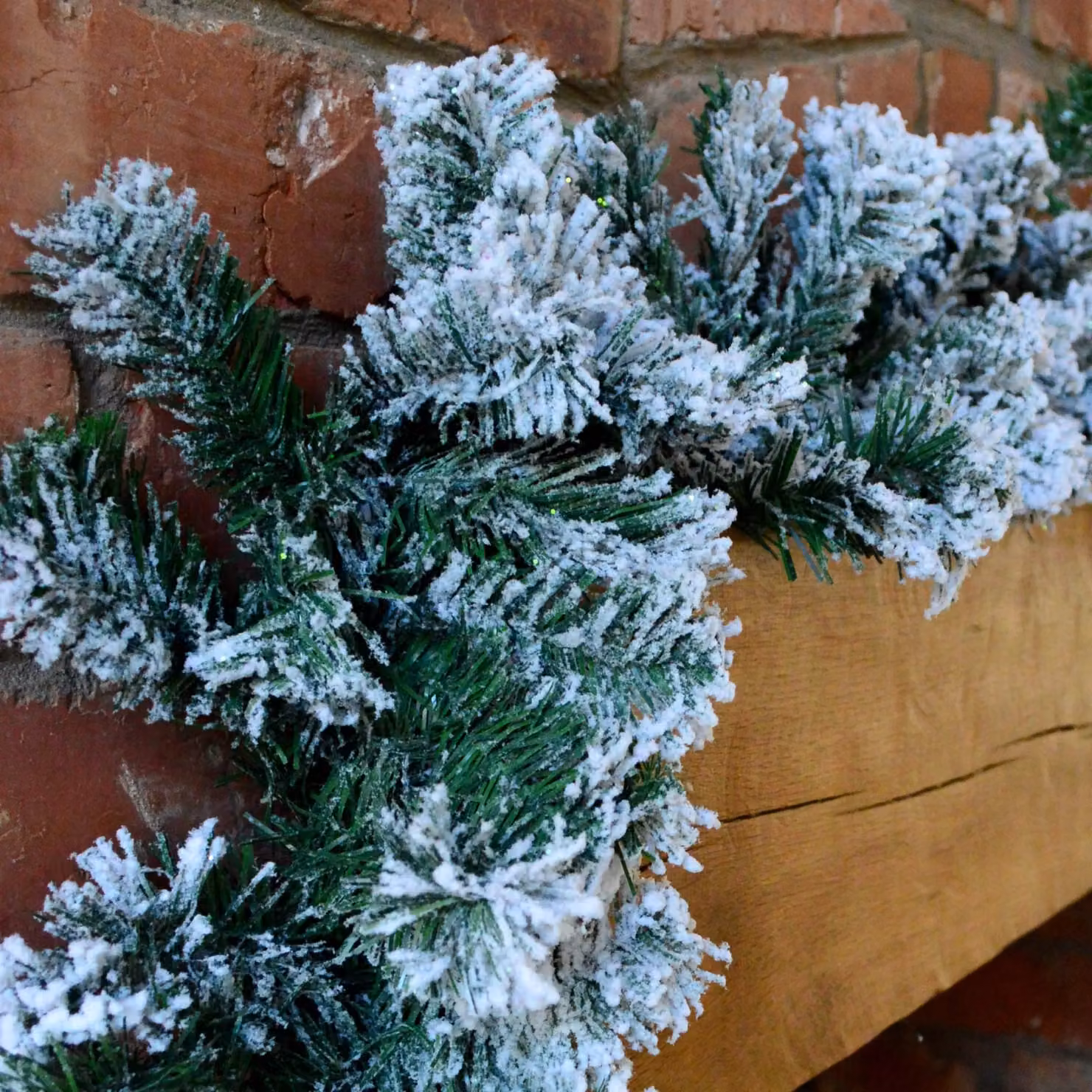 Samuel Alexander Premier 2.7m Snow Flocked Pine Christmas Garland with Glitter Finish in Green – 4
