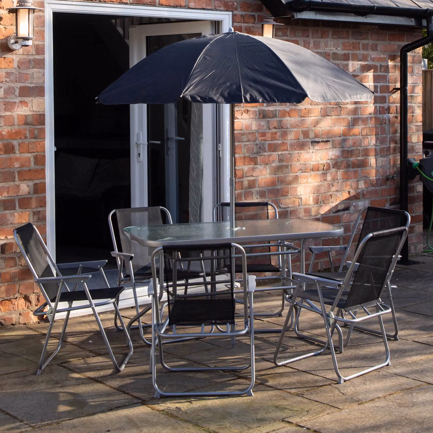 Samuel Alexander 8 Person Garden Furniture Set with Table, Chairs and Parasol in Black and Grey – 2