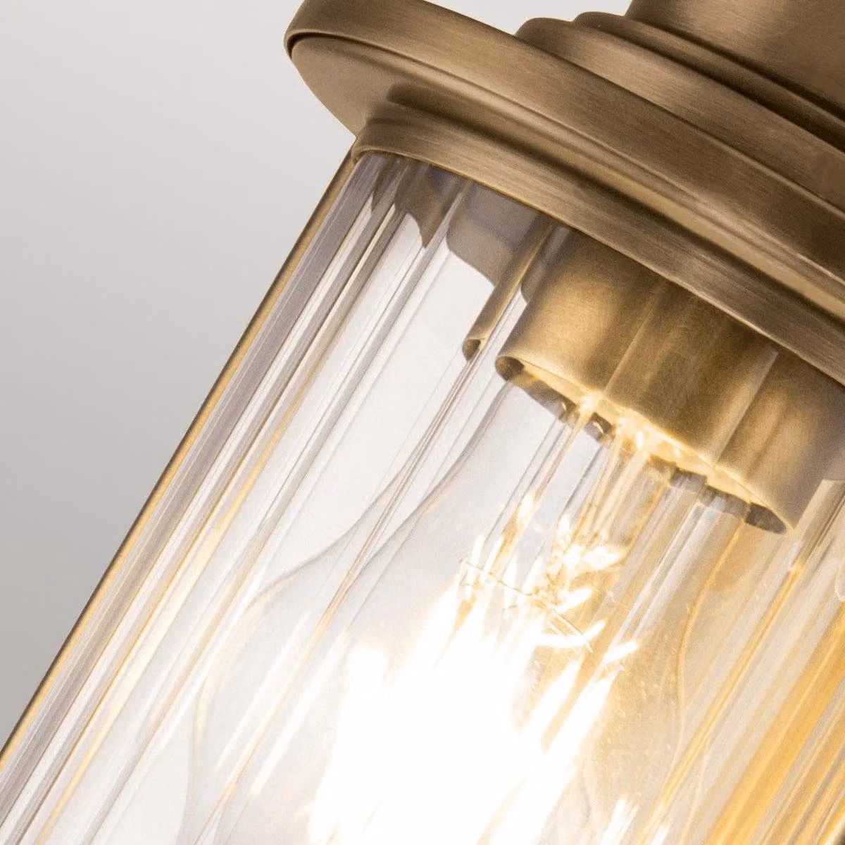 Quoizel Riggs Wall Lamp in Weathered Brass and Yellow Glass, IP44 Rated for Bathroom Use – 3