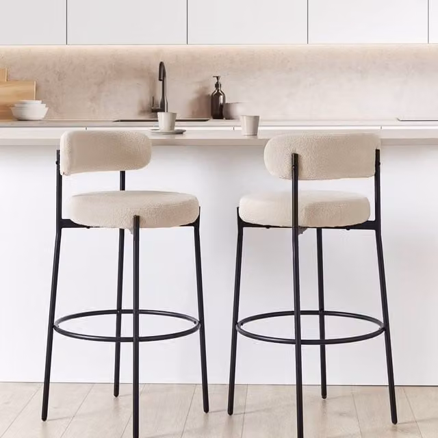 Wyld and Coco Set of 2 Modern Bouclé Bar Stools in Beige with Black Metal Legs – 1