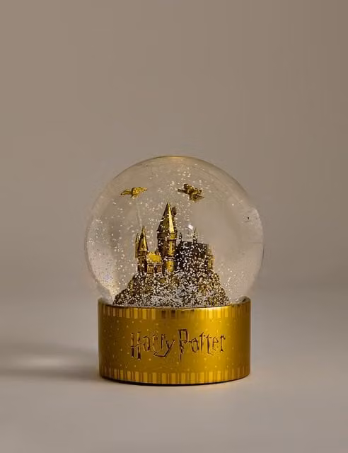 M&S Harry Potter Hogwarts Extra Large Gold Mix Glass Snow Globe