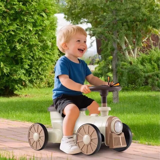 Costway White Ride on Push Car Toy with Light and Sound Effects