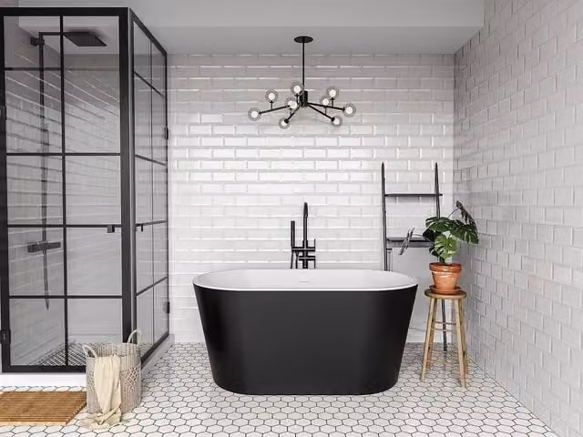 Vente-unique Oval Freestanding Acrylic Bathtub in Black, W/D/H: 130 x 71 x 58 cm – 1
