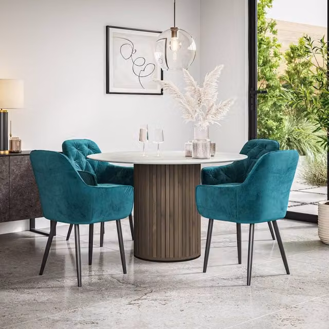 More4Homes Arlo White Marble Top Round Dining Table with Walnut Legs and 4 Anika Blue Velvet Dining Chairs