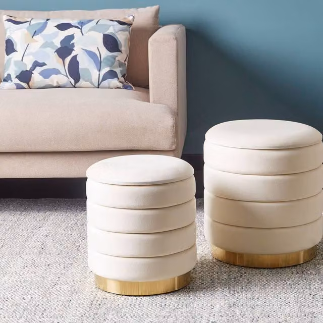 Wyld and Coco Set of 2 Beige Velvet Cylindrical Storage Pouffes with Gold Metal Base